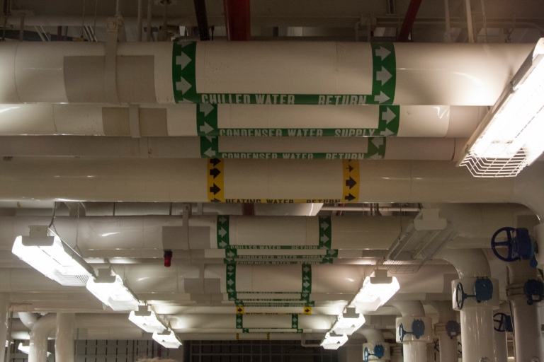 Water pipes on the ceiling of the mechanical room.